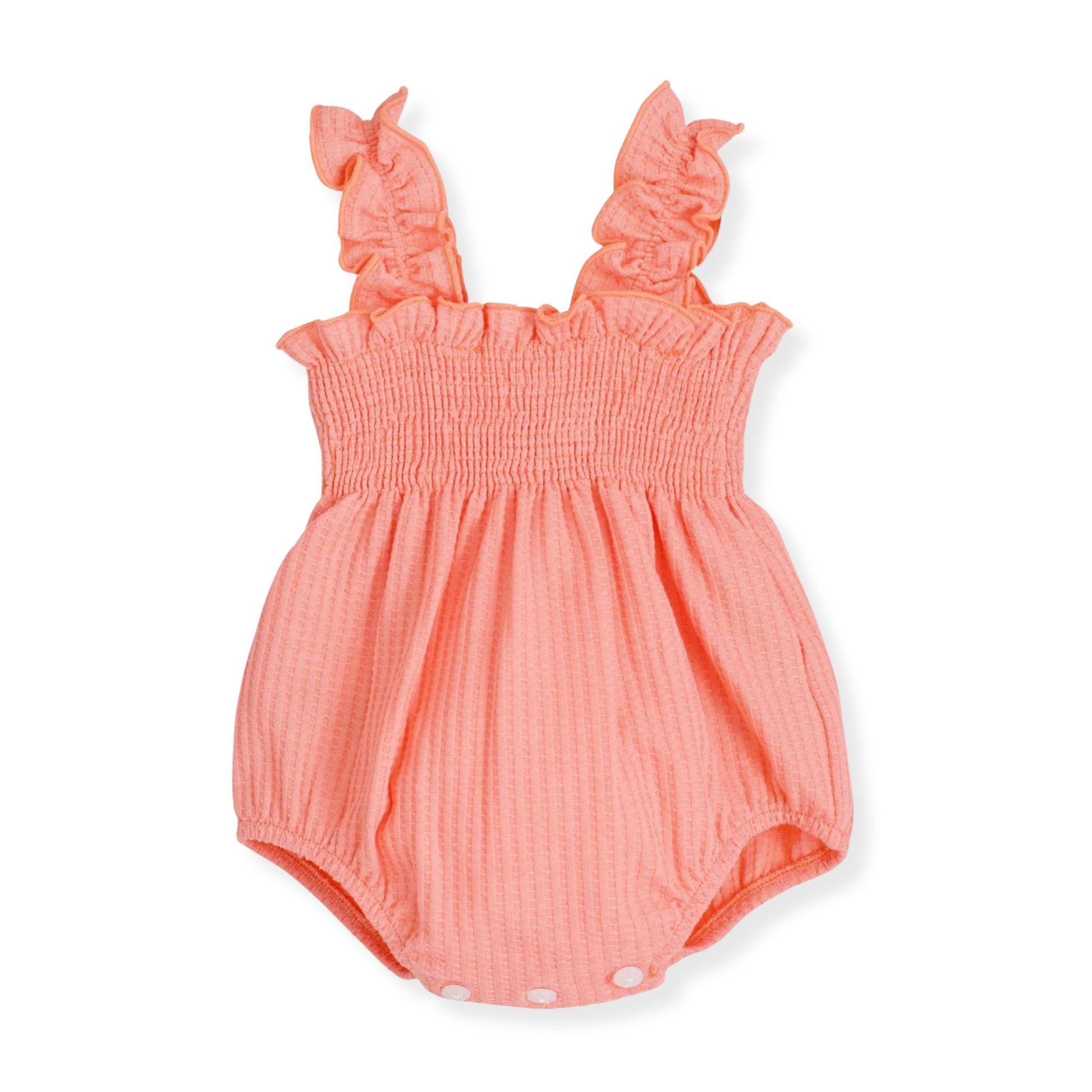Coral baby romper with ruffled straps on a white background