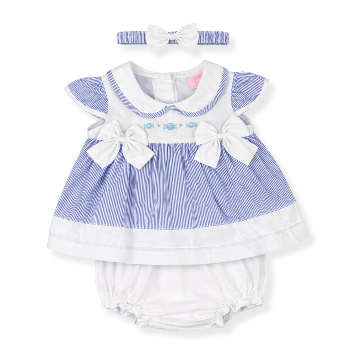 Baby dress with ruffles, bows, and matching headband on a white background