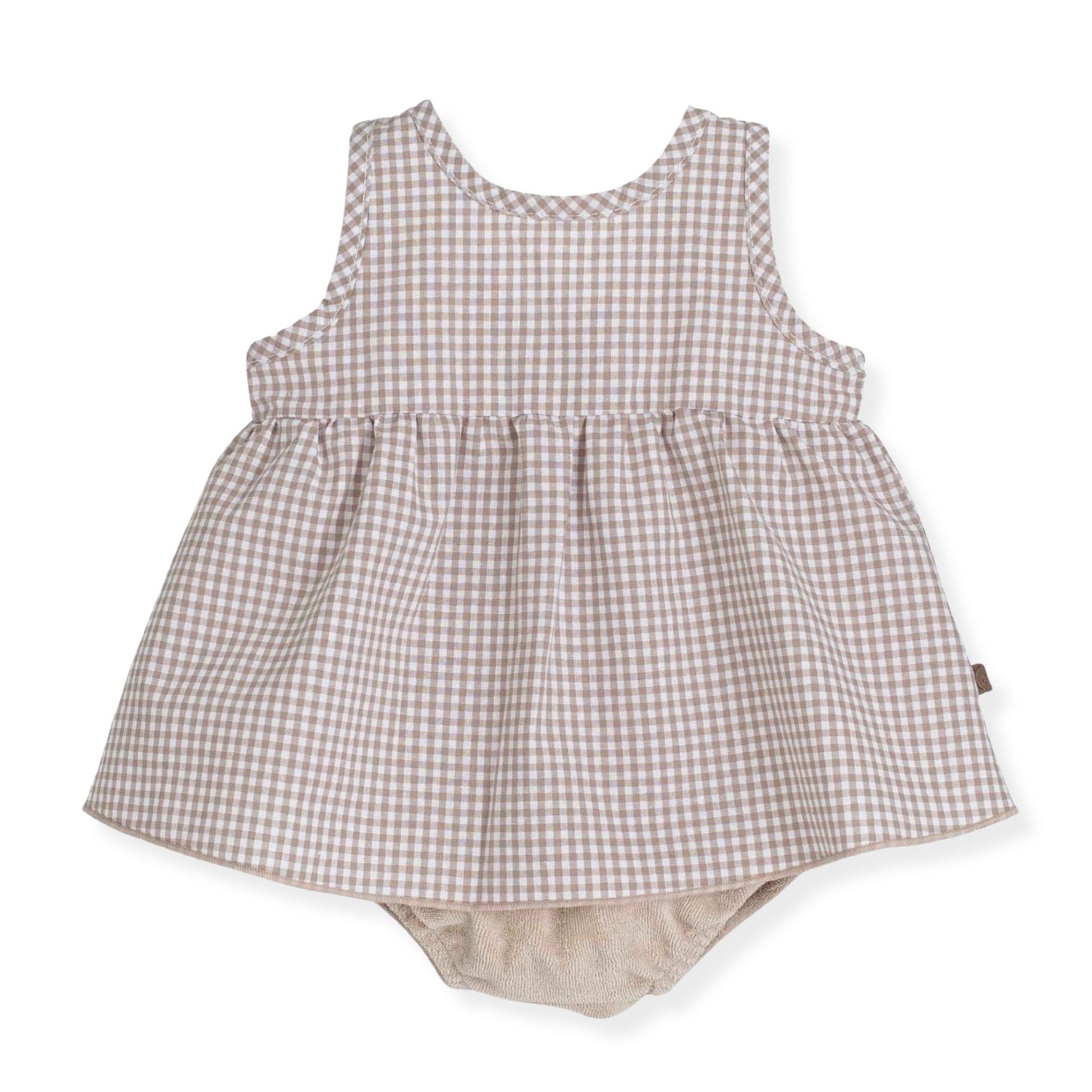 Baby romper with gingham pattern on a white background