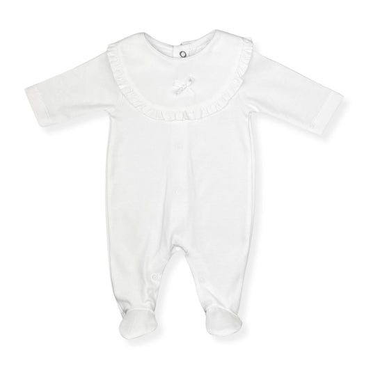 White baby sleepsuit / babygrow with a bow on a white background 