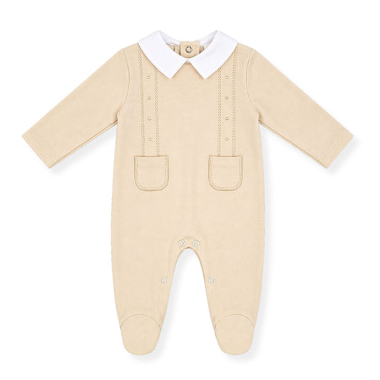 Beige baby boys babygrow with white collar, front pocket detail and long sleeves on a white background
