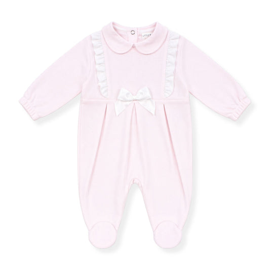 Pink baby girls’ babygrow with Peter Pan collar, white frill detailing and satin bow, long sleeves and footed design on a clean white background