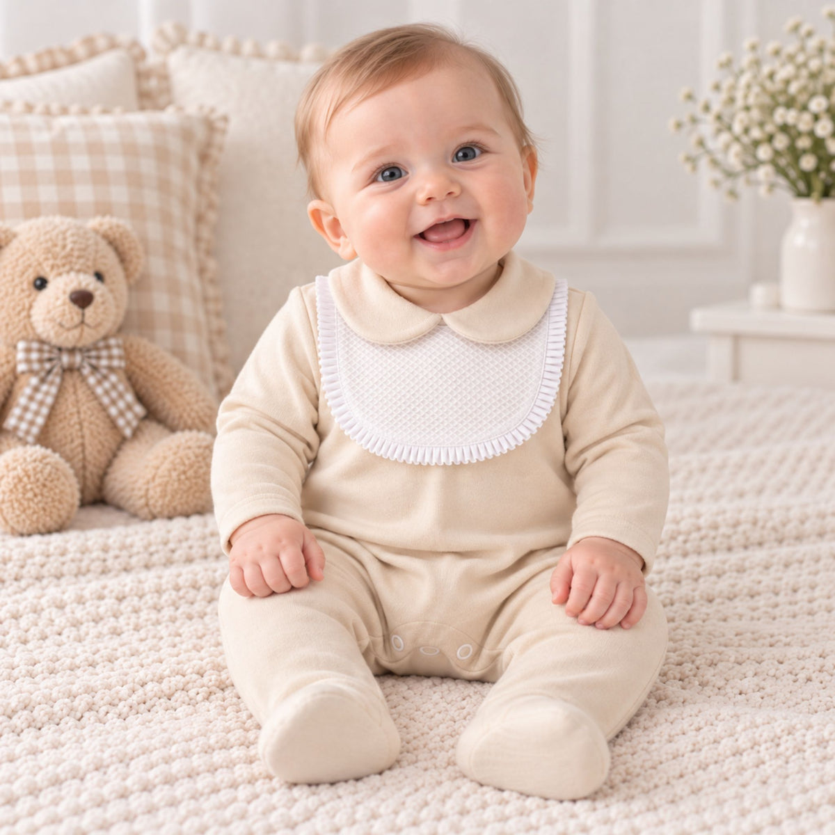 beige baby sleepsuit