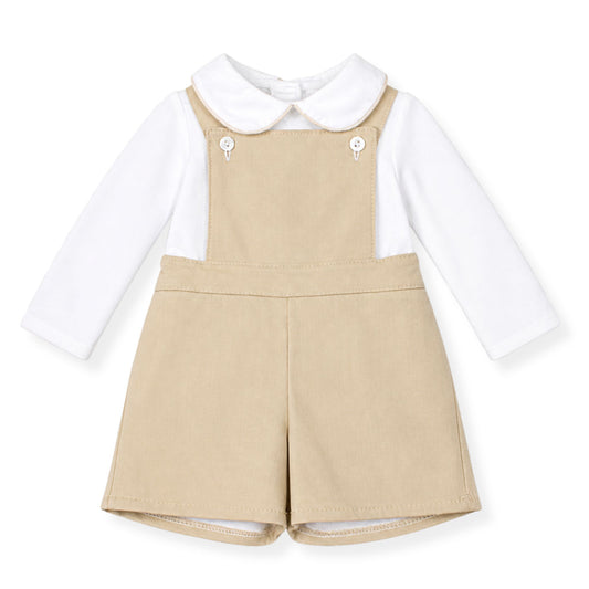baby boys outfit with beige dungaress and white shirt on a white background