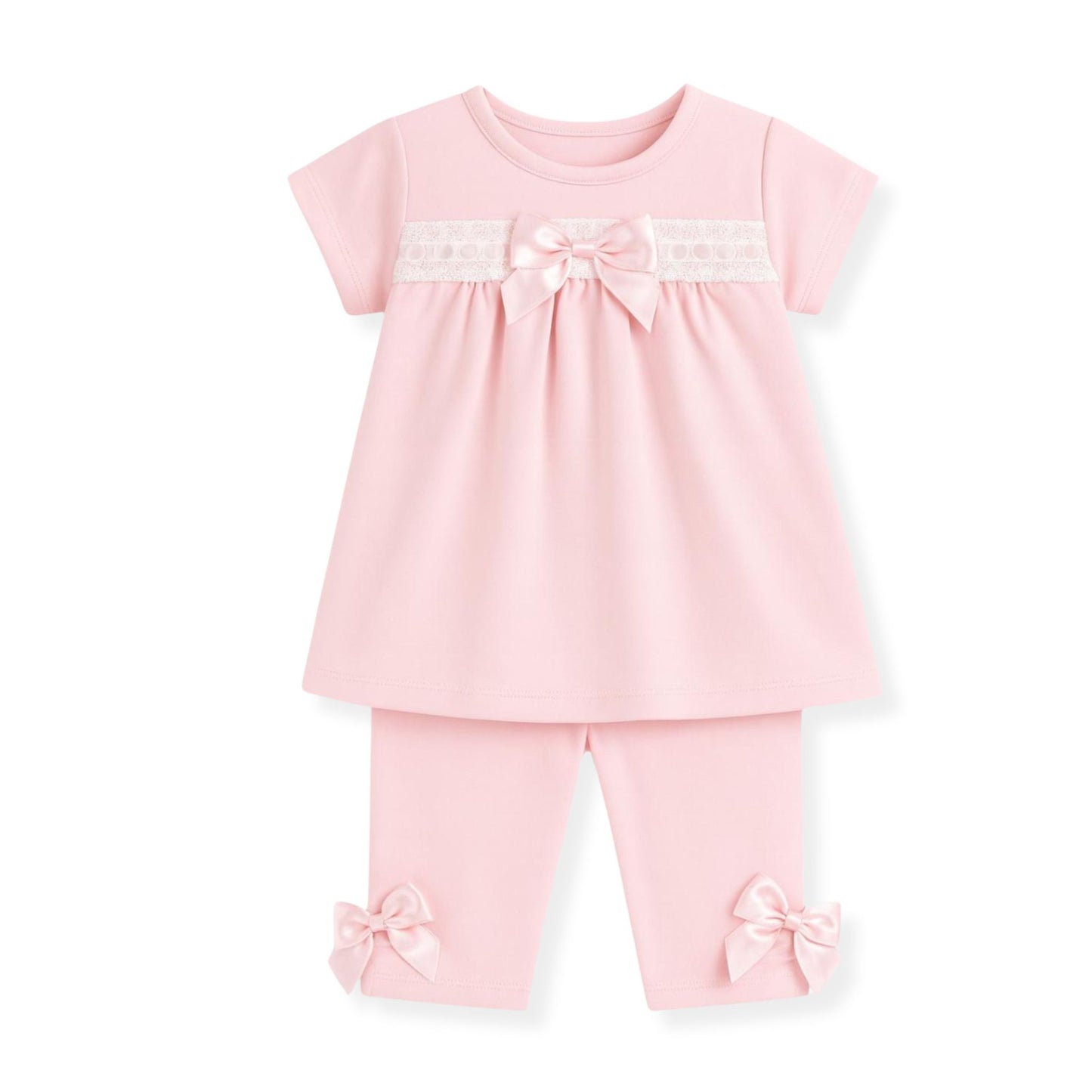 Pink baby outfit with a top and leggings on a white background