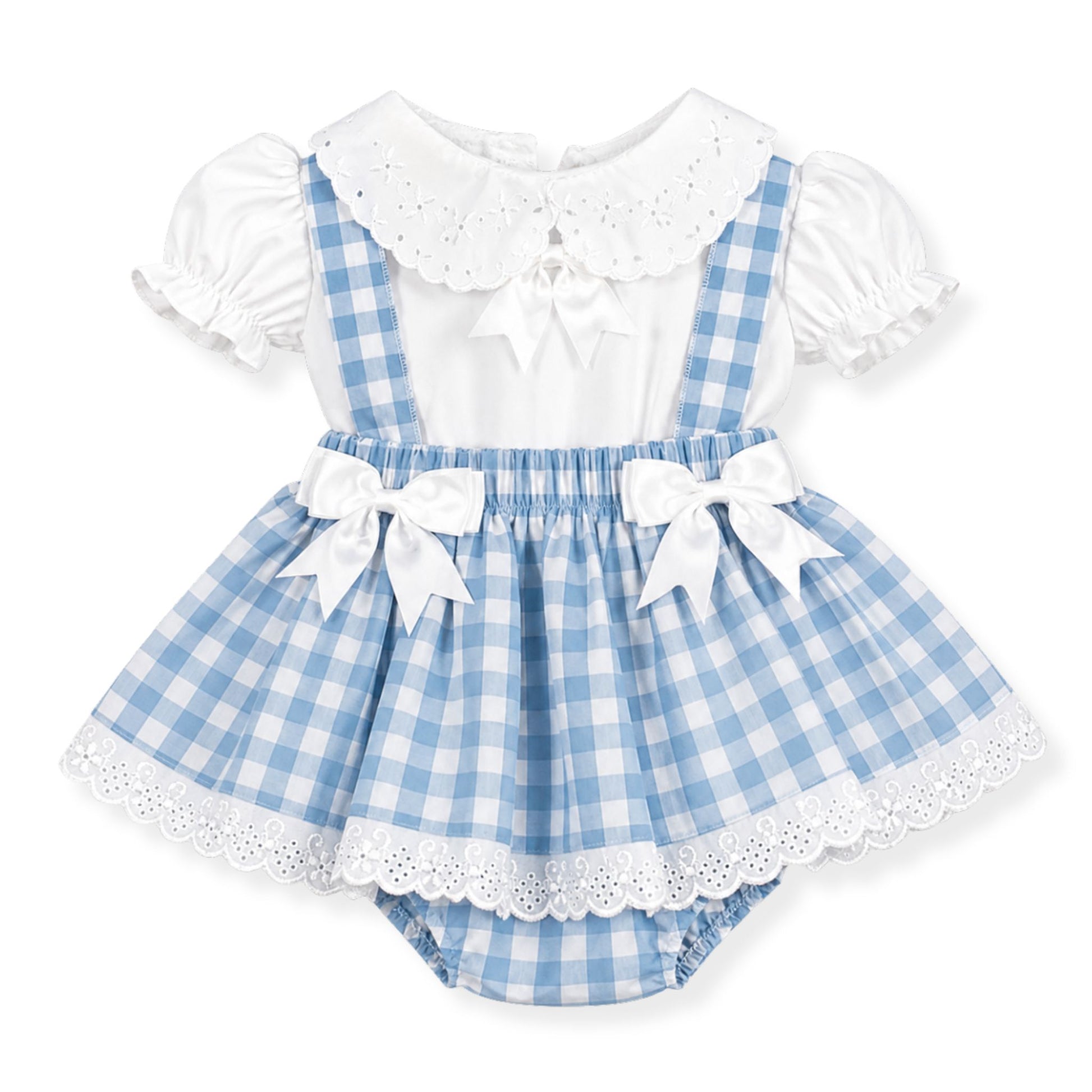 Blue and white checkered dress with puffed sleeves and lace details on a white background