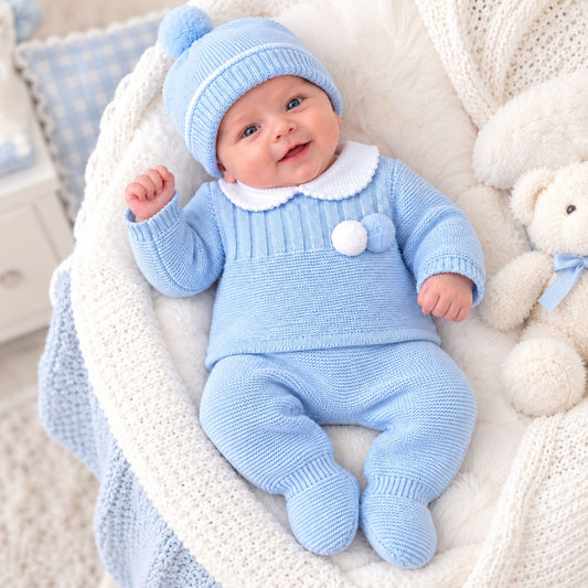 Baby boys blue knitted three piece outfit with pom pom jumper trousers and matching hat