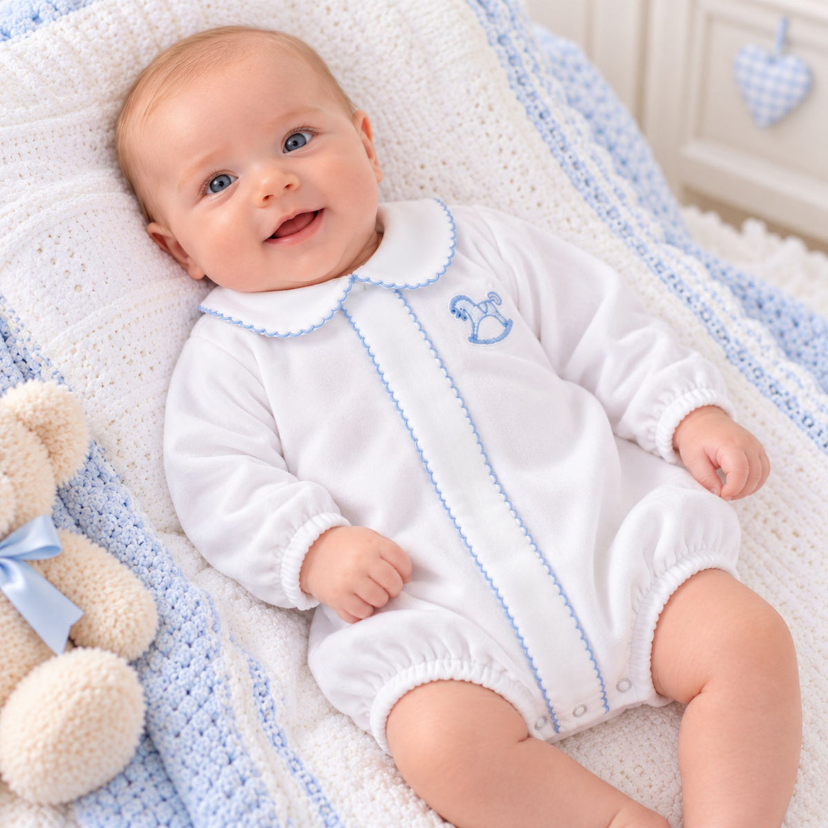 Dandelion baby boys white velour romper with blue piping and embroidered rocking horse