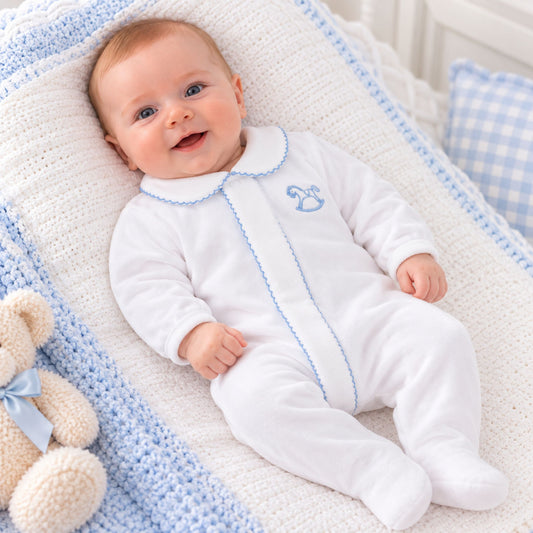 Dandelion baby boys white velour sleepsuit with blue piping and embroidered rocking horse