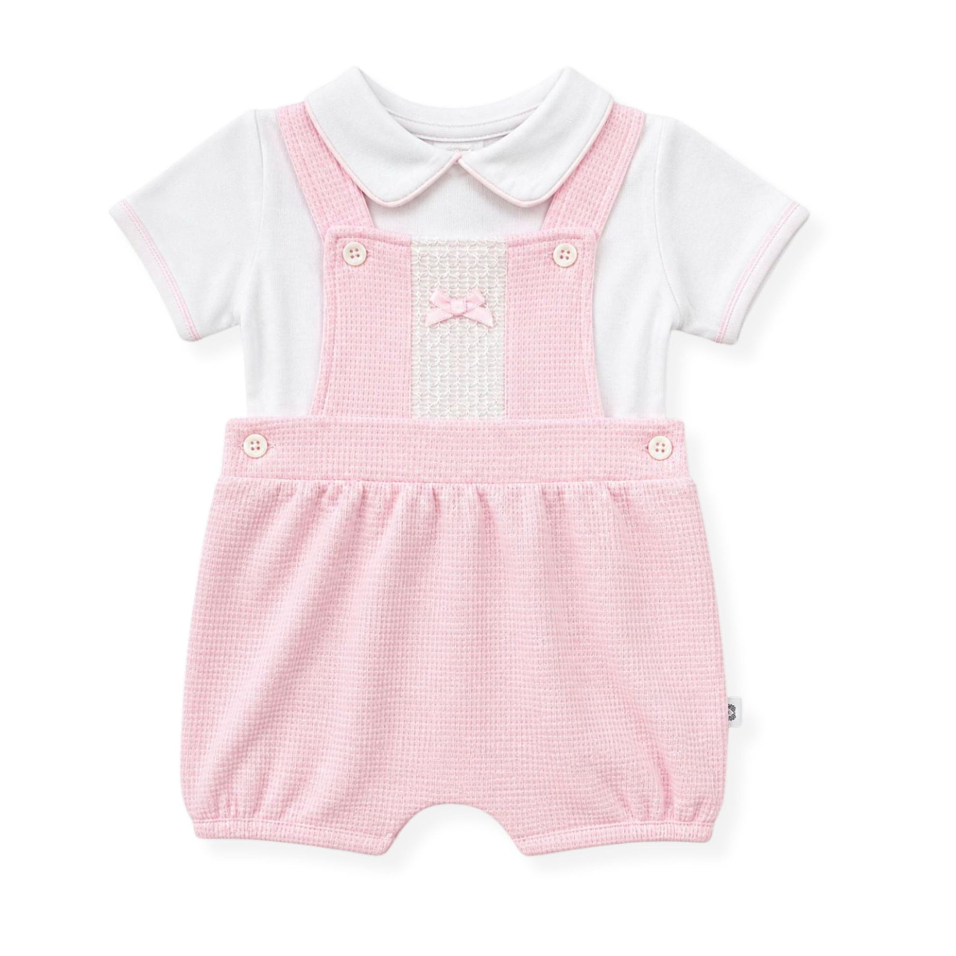 baby girls two piece set with pink dungarees in a spanish style
