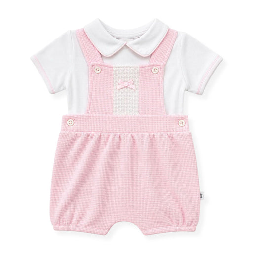 baby girls two piece set with pink dungarees in a spanish style