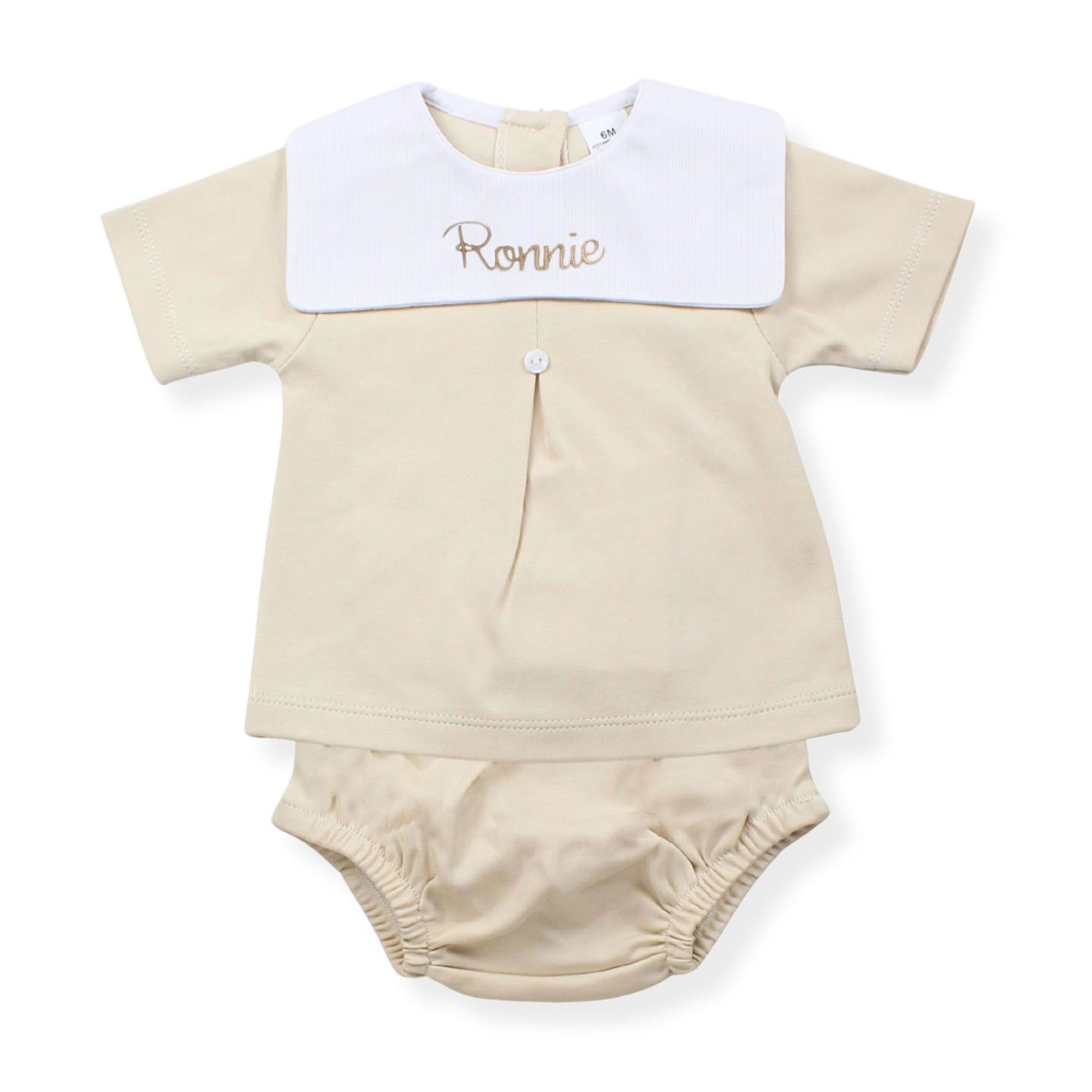 Personalised beige baby top and jam pants set with embroidered name detail, made from 100% cotton in Portugal. Traditional baby outfit available in sizes 0-3 to 18-24 months.