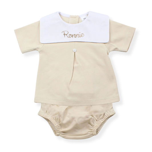 Personalised beige baby top and jam pants set with embroidered name detail, made from 100% cotton in Portugal. Traditional baby outfit available in sizes 0-3 to 18-24 months.