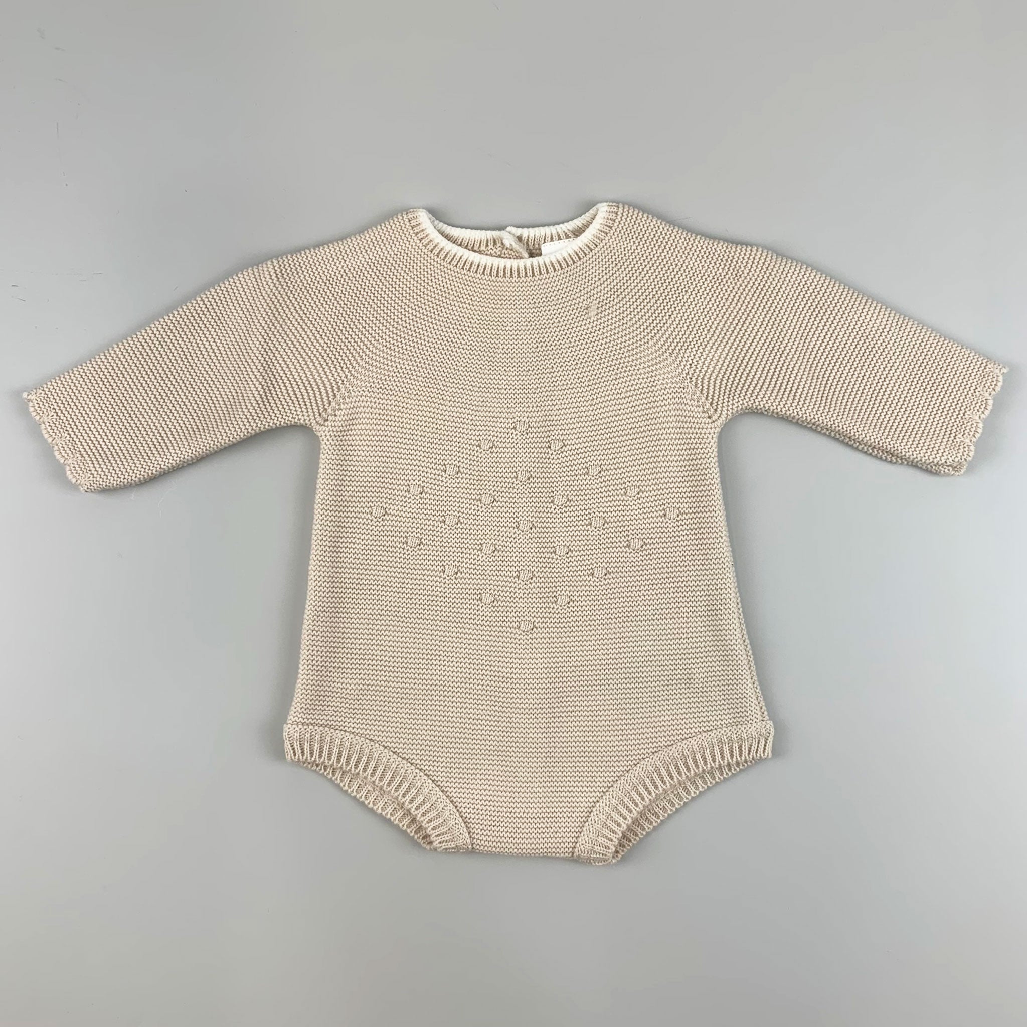 beige baby romper