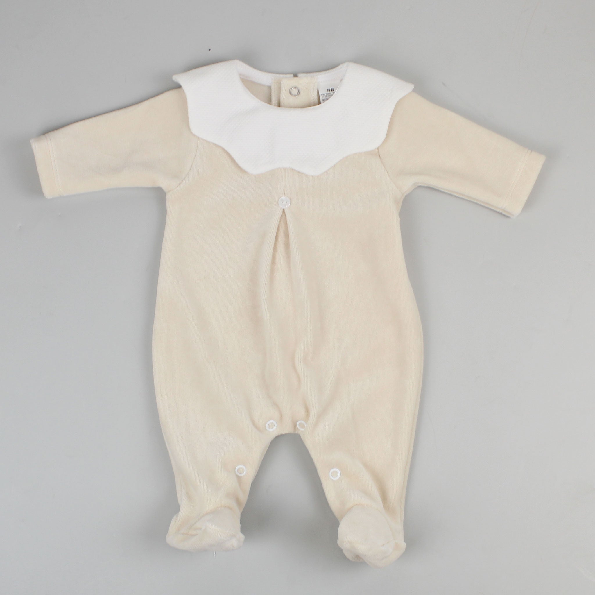 beige baby sleepsuit