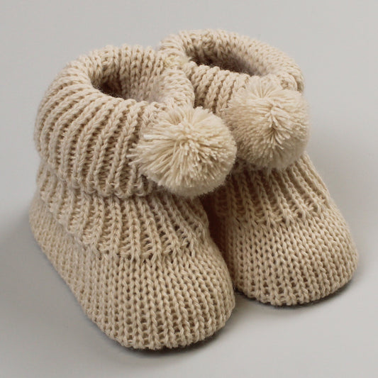 baby beige knitted pom pom boots