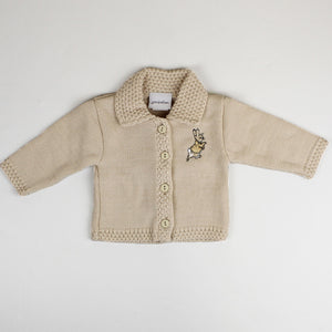 beige baby cardigan with rabbit