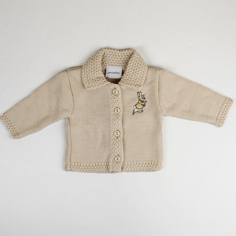 beige baby cardigan with rabbit