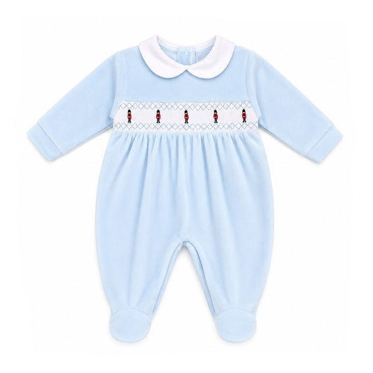 Kleo Kids blue velour baby sleepsuit with smocked guardsmen embroidery and white rounded collar made in Portugal