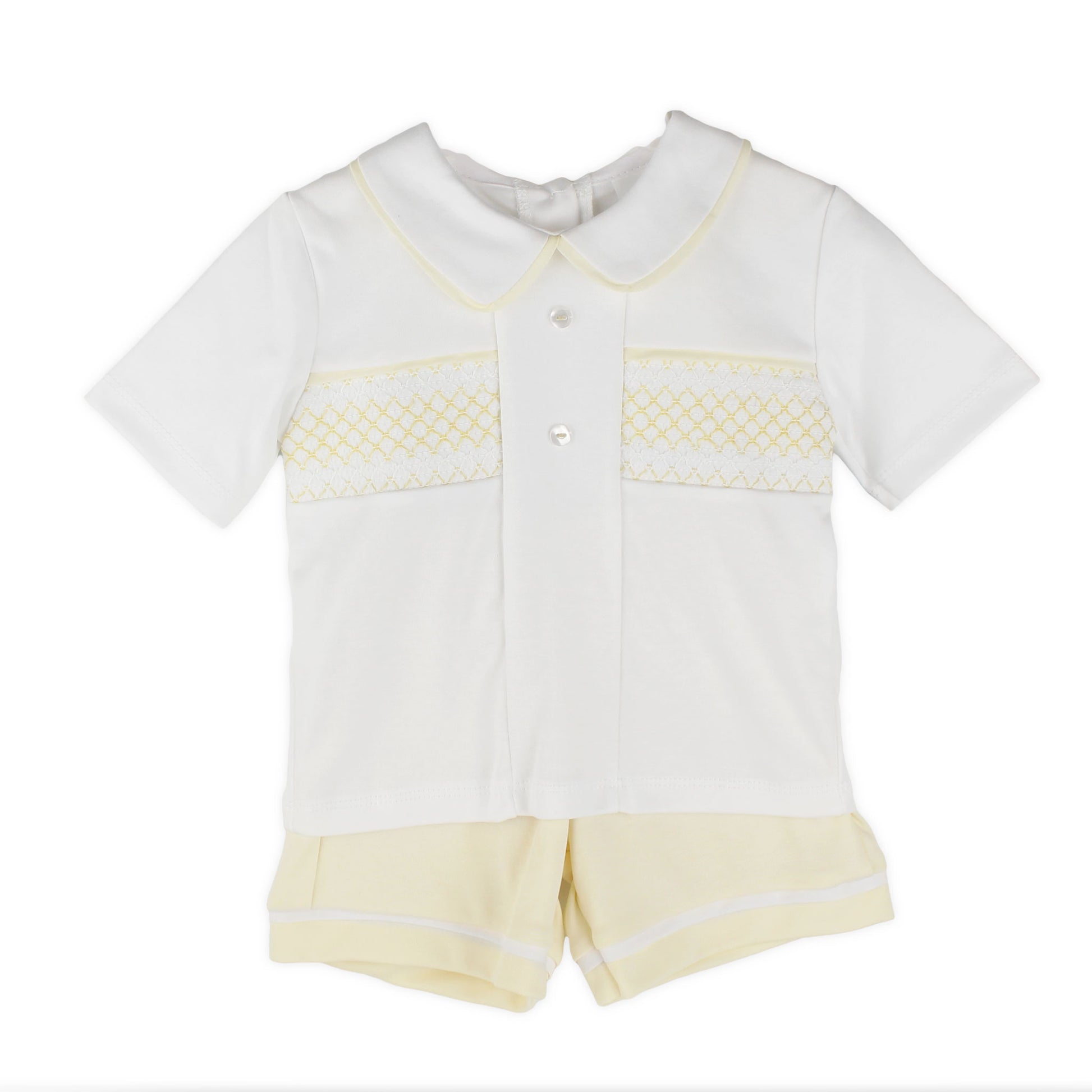 White shirt with yellow smocking and yellow shorts for a baby or toddler on a white background