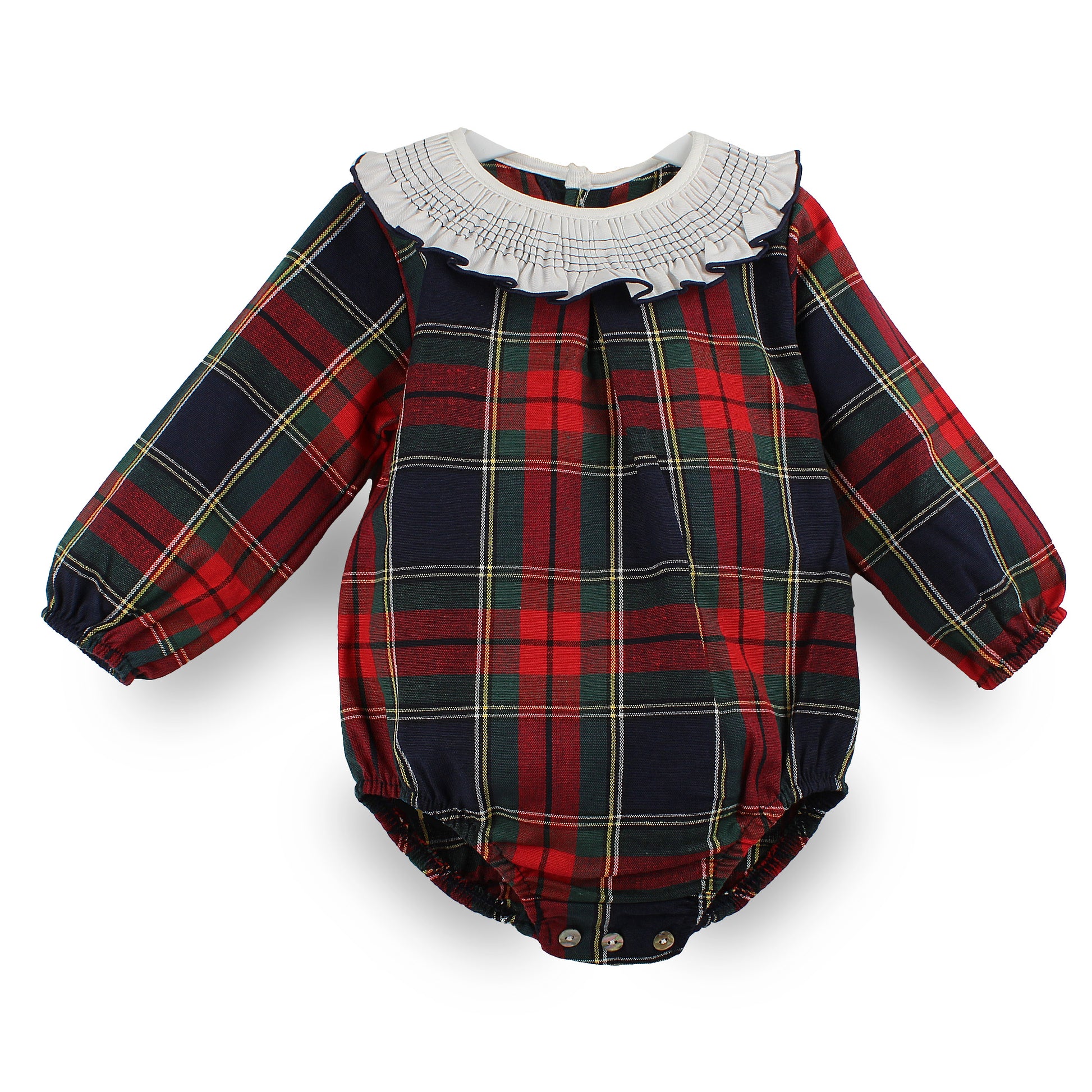 A baby long-sleeve romper featuring a red, green, and navy blue tartan plaid pattern, a white ruffled smocked collar, and elasticized leg openings.