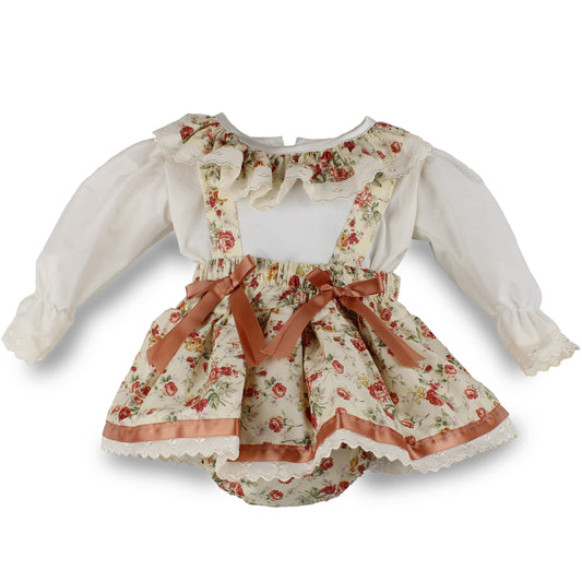Baby girls cream floral pinafore skirt outfit with rust satin bows