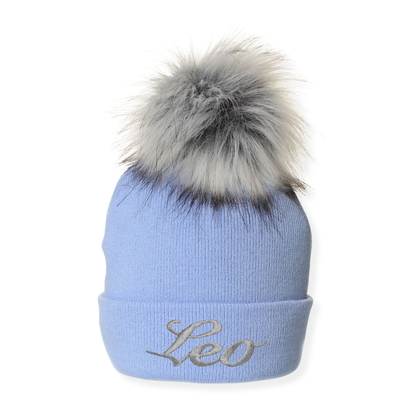 Light blue beanie with gray fur pom-pom and 'Leo' embroidery on a white background