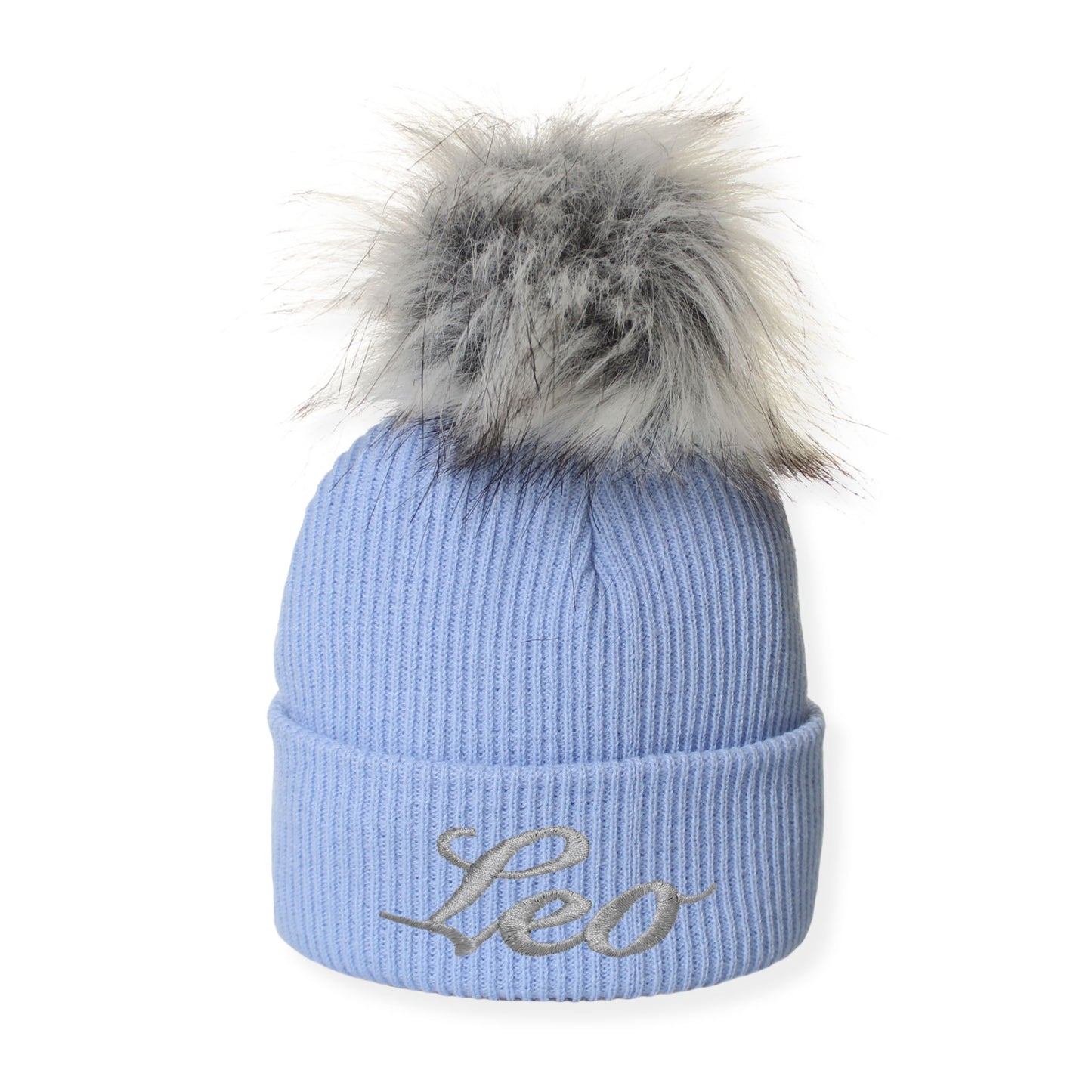 Blue beanie with gray fur pom-pom and 'Leo' embroidery on a white background