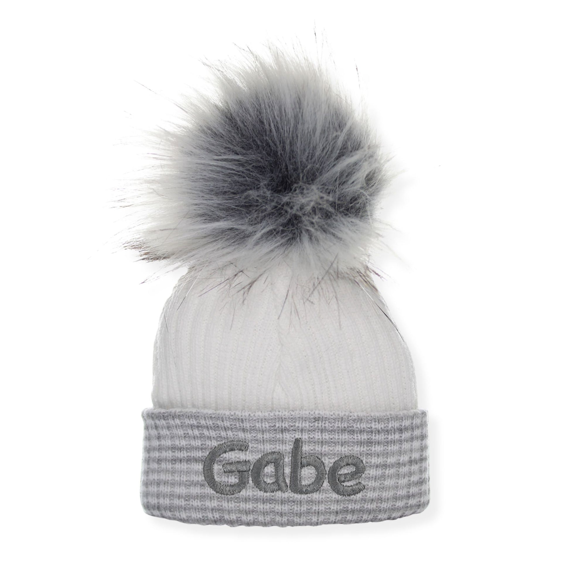 Gray beanie with a large pom-pom and 'Gabe' embroidery on a white background