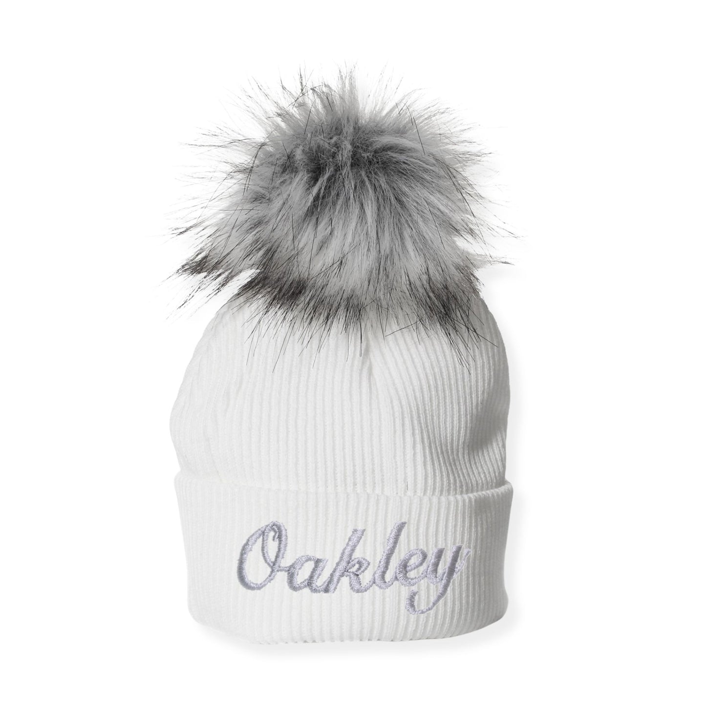 White beanie with gray fur pom-pom and 'Oakley' embroidery on a white background