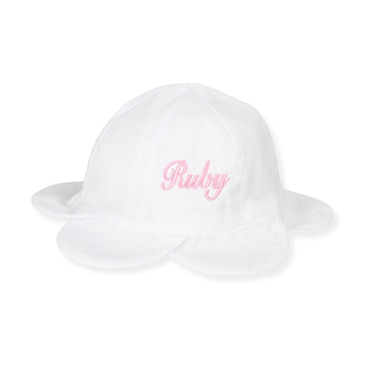White bucket hat with 'Ruby' embroidered in pink on a white background