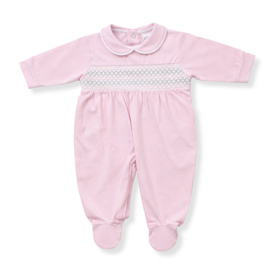 Pink baby onesie with a white collar on a white background