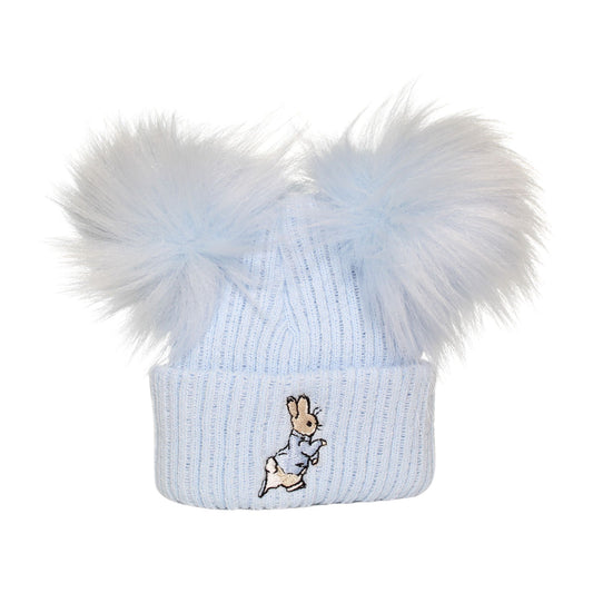 Light blue knit baby hat with a fluffy pom-pom and embroidered character on a white background