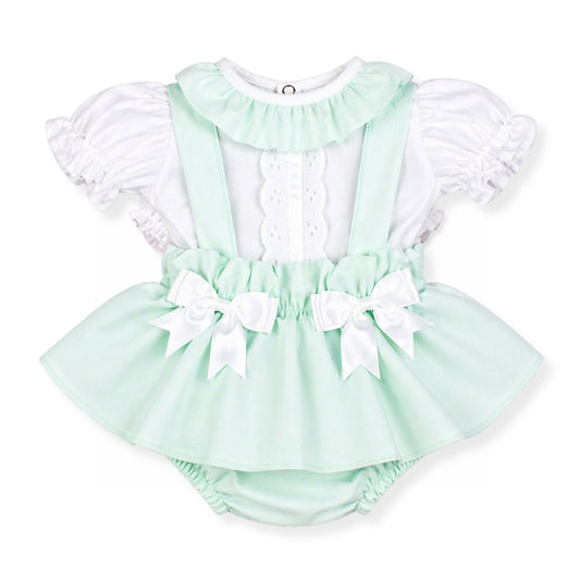 Mint green baby romper with white ruffles and bows on a white background