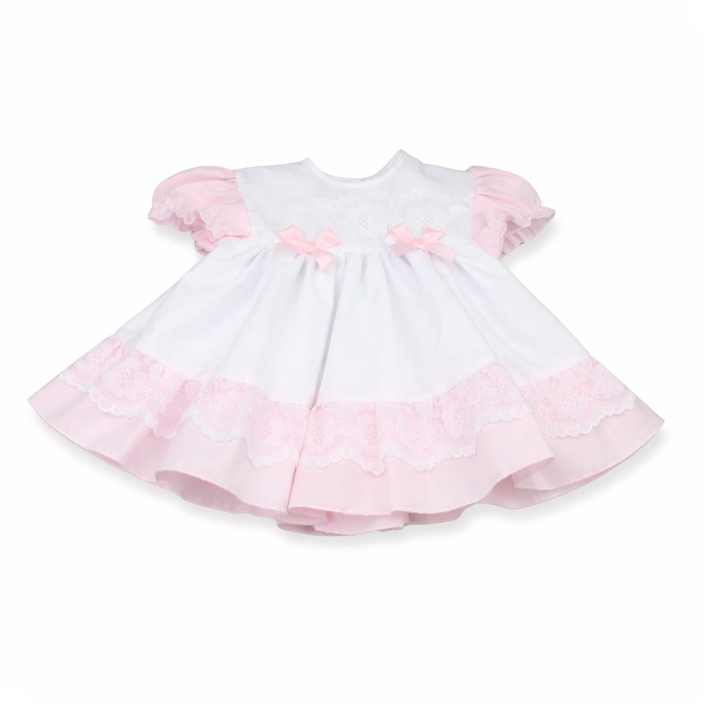 White dress with pink ruffled sleeves and hem on a white background