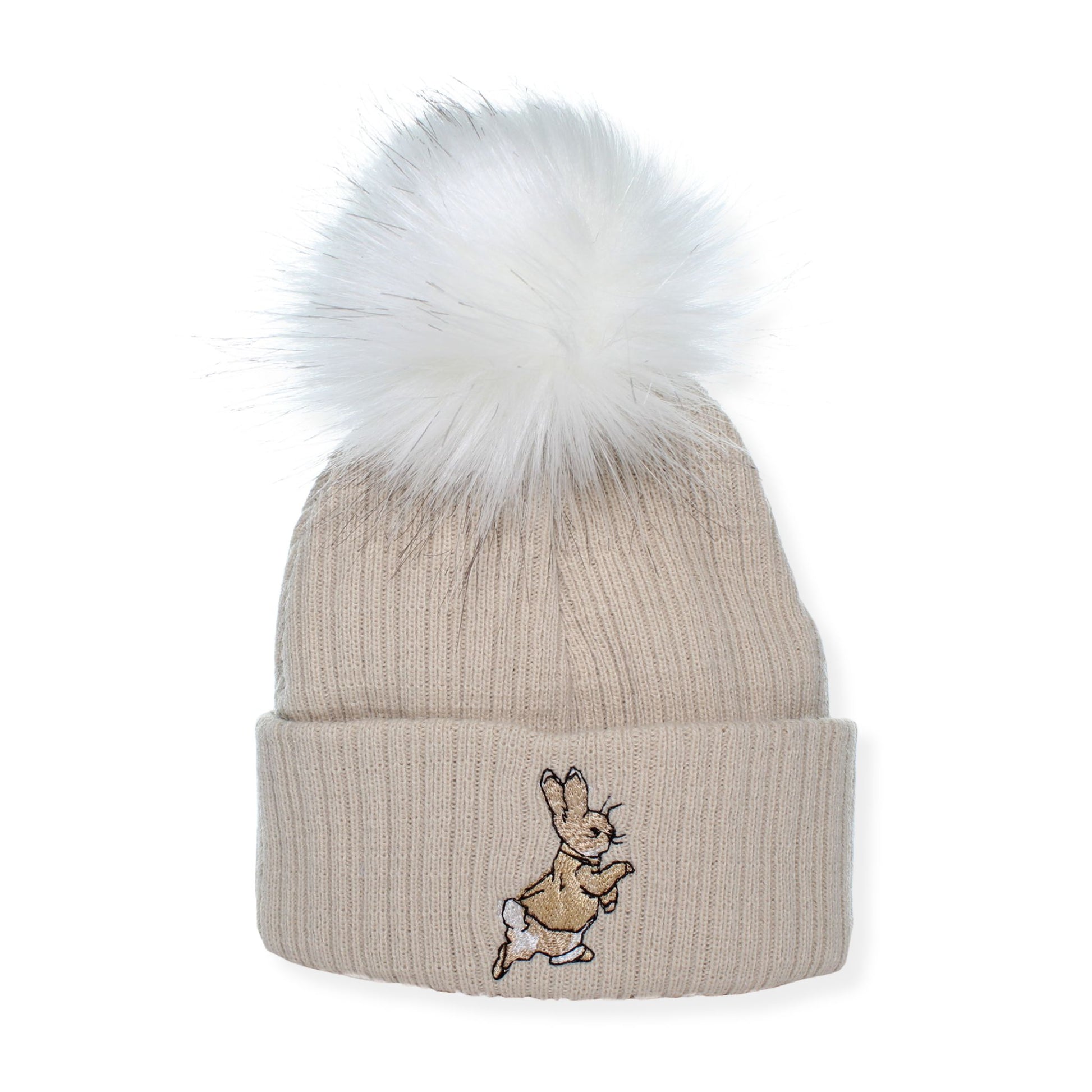 Beige beanie with white fur pom-pom and embroidered design on a white background