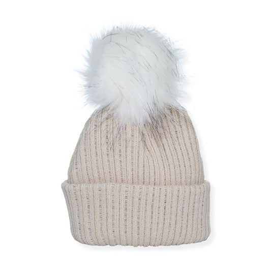 Beige knit beanie with a white faux fur pom-pom on a white background