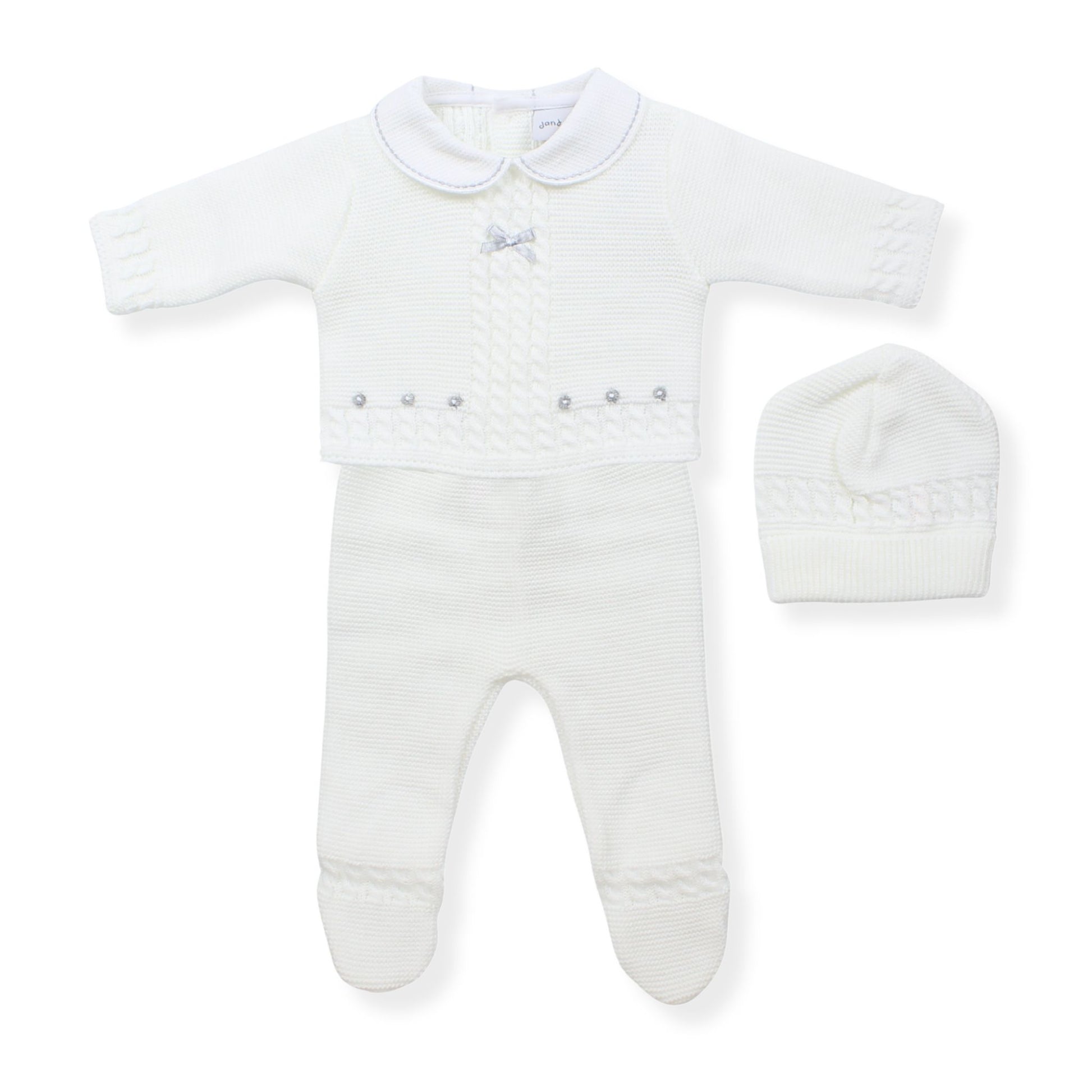 White baby two piece outfit with collar and matching hat on a white background