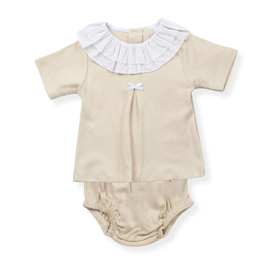 Beige baby outfit with white ruffled collar on a white background