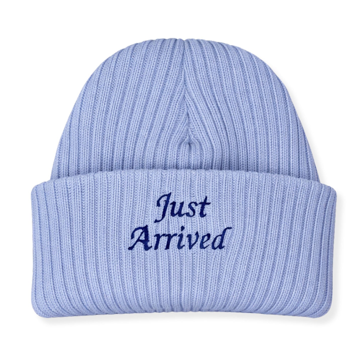 Light blue knit beanie with 'Just Arrived' text on a white background