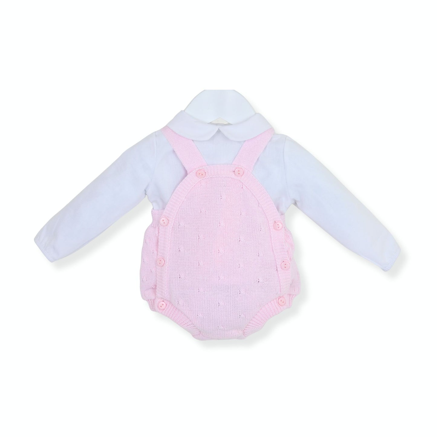 Baby outfit with light blue shirt and pink overalls on a white background