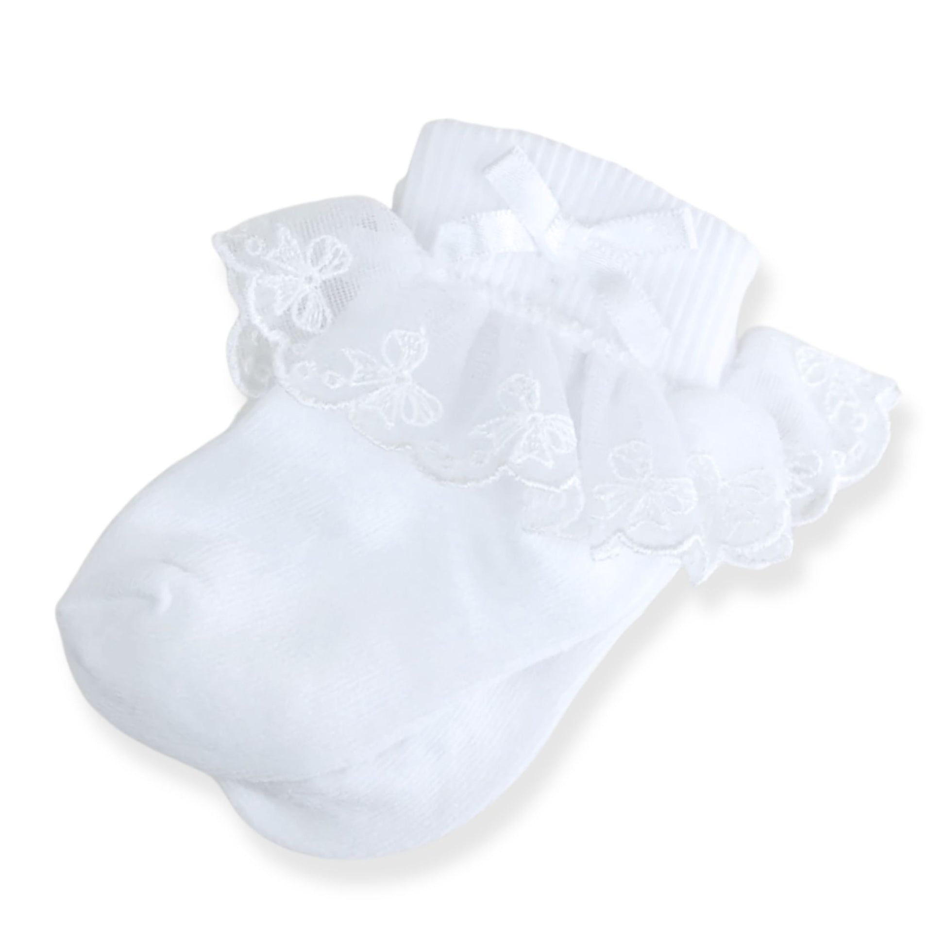 White baby socks with lace details on a white background