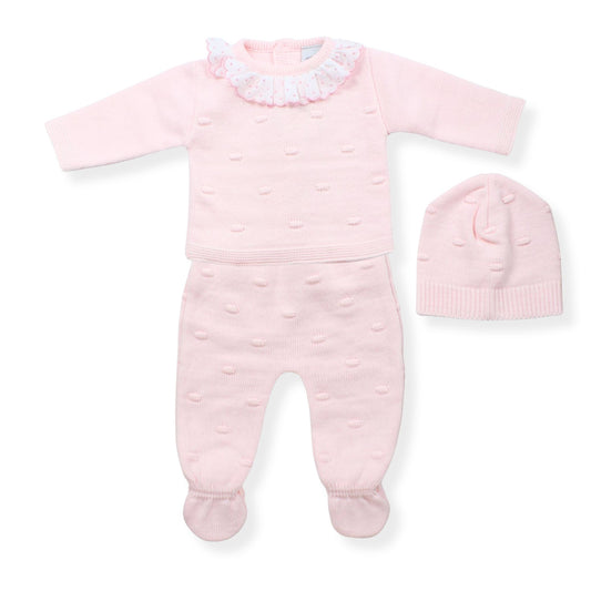 Pink baby outfit with matching hat on a white background