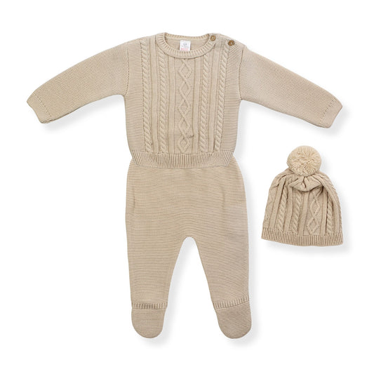 Beige knitted baby outfit with matching hat on a white background
