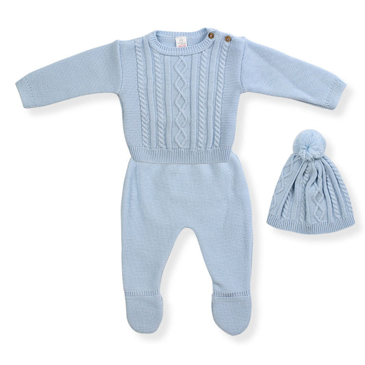 Blue knitted baby outfit with matching hat on a white background