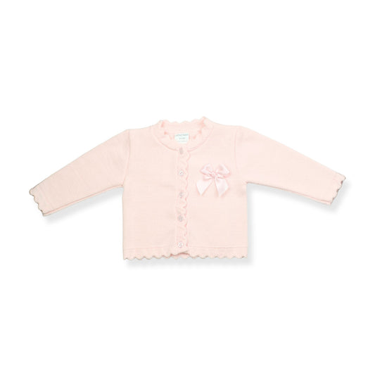 Light pink baby cardigan with a bow on a white background