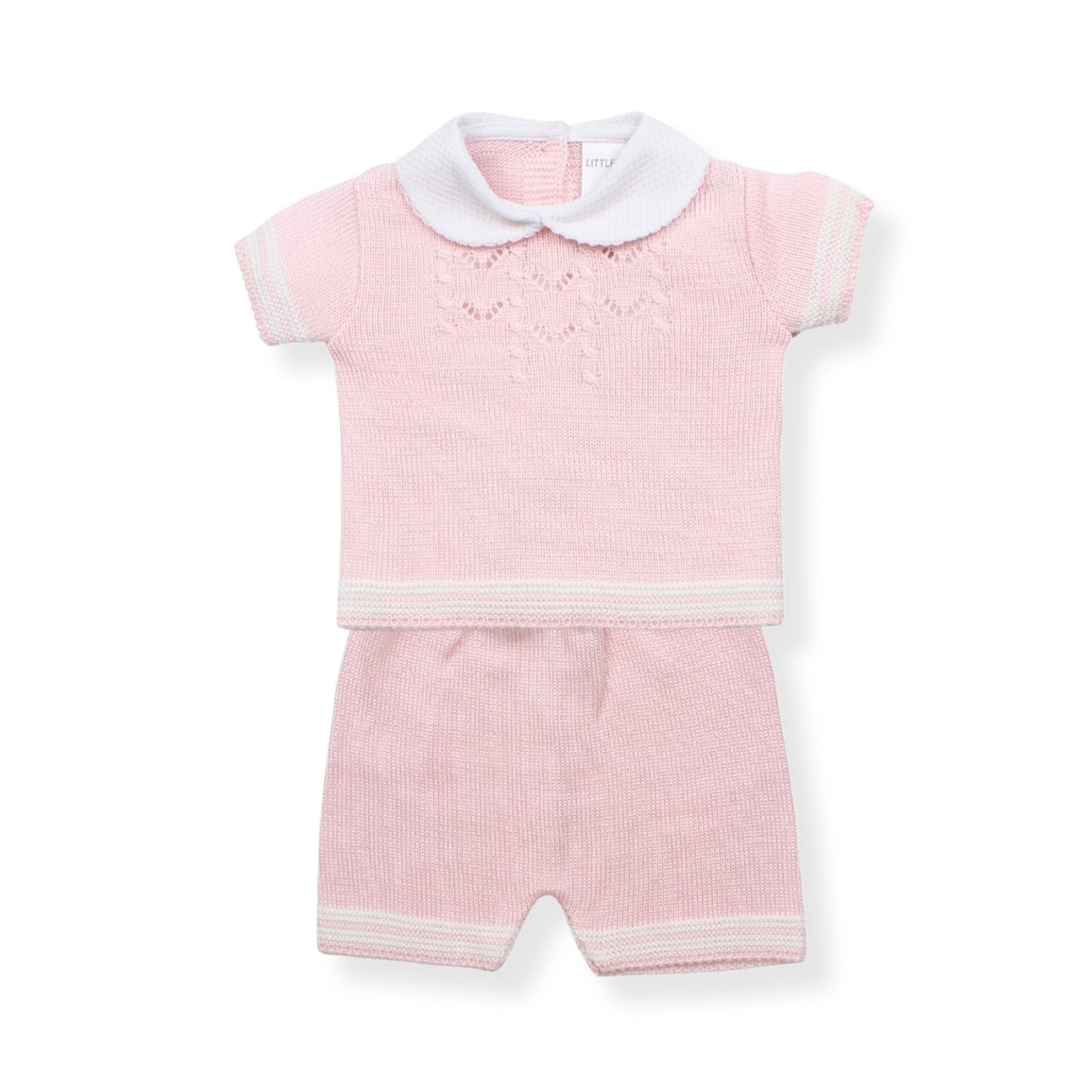 Pink baby outfit with white collar on a white background