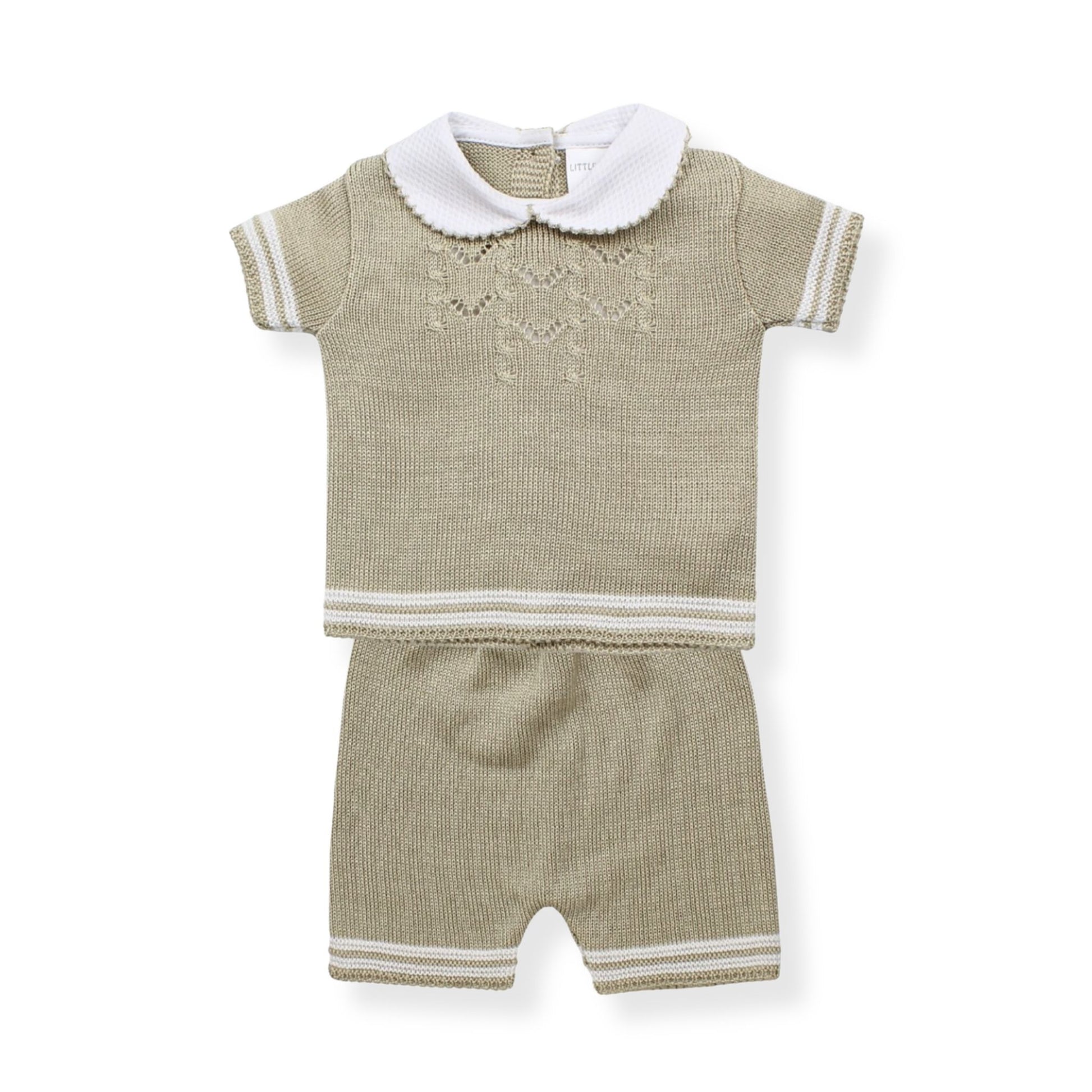 Knitted baby outfit with short-sleeve top and shorts on a white background