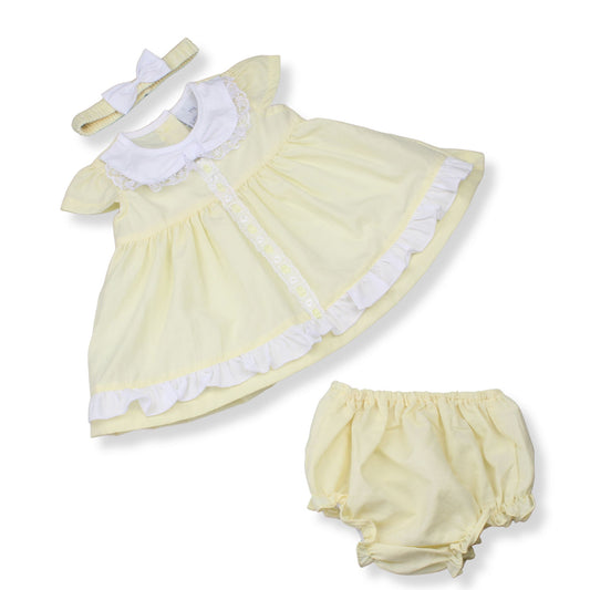 Yellow baby dress with white trim, matching headband, and bloomers on a white background