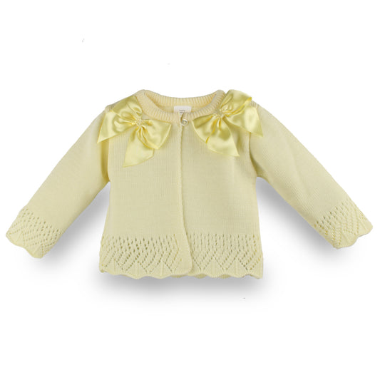 lemon yellow baby girl cardigan with bows in a spanish style